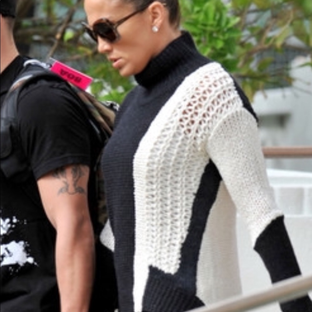 Helmet Lang Melange knit turtleneck sweater.